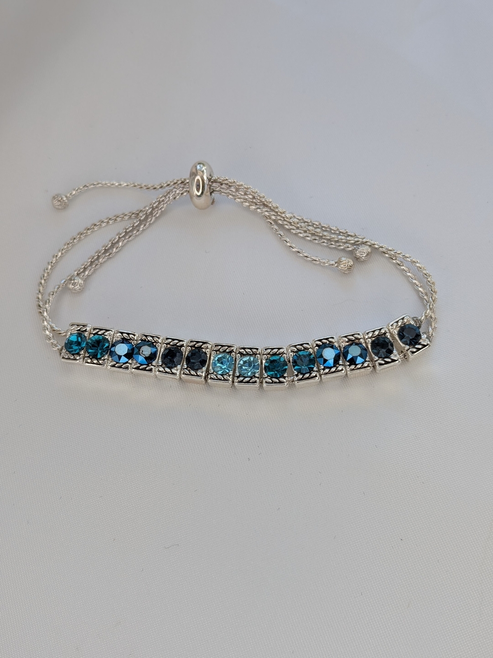 Napier Silver Tone Blue Crystal Rhinestone Bolo Bracelet | Adjustable